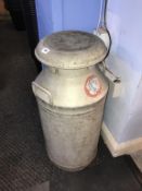 An aluminium milk churn