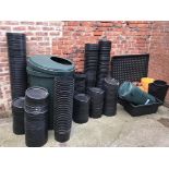 A large quantity of plant pots etc.