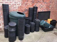 A large quantity of plant pots etc.