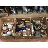 Three boxes of assorted oil lamps etc.