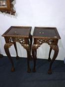 A pair of reproduction mahogany plant stands