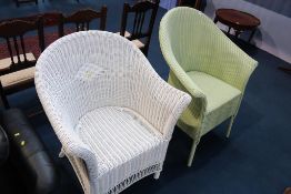 A modern Lloyd Loom chair and one other