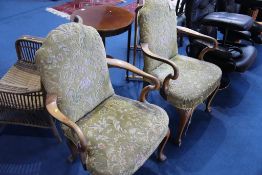 A pair of mahogany armchairs