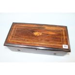 A rosewood and marquetry inlaid musical box, playing 8 airs