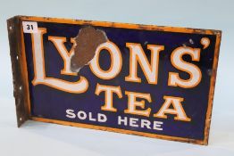 A wall mounted 'Lyons Tea Sold Here', enamel sign, 38 x 23cm