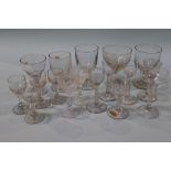 A collection of 19th century and 20th century clear glass wine glasses, various