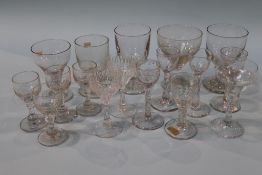 A collection of 19th century and 20th century clear glass wine glasses, various