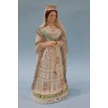 A 19th century Staffordshire figure, 'Queen of England'