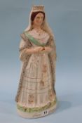 A 19th century Staffordshire figure, 'Queen of England'