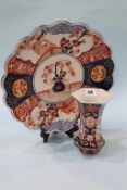 A Japanese Imari vase and a pair of wall chargers