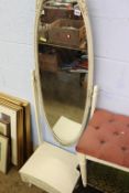 A Marie Antoinette style cheval mirror and stool