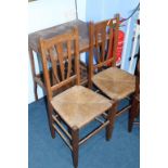 A pair of oak chairs and an occasional table