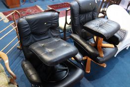 Two leather revolving chairs