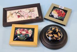 Four modern mounted Moorcroft plaques