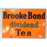 An enamel sign 'Brooke Bond Dividend Tea', 42 x 63cm