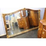 An ornate gilt framed over mantle mirror, 186cm