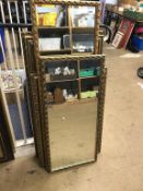 A quantity of gilt framed mirrors