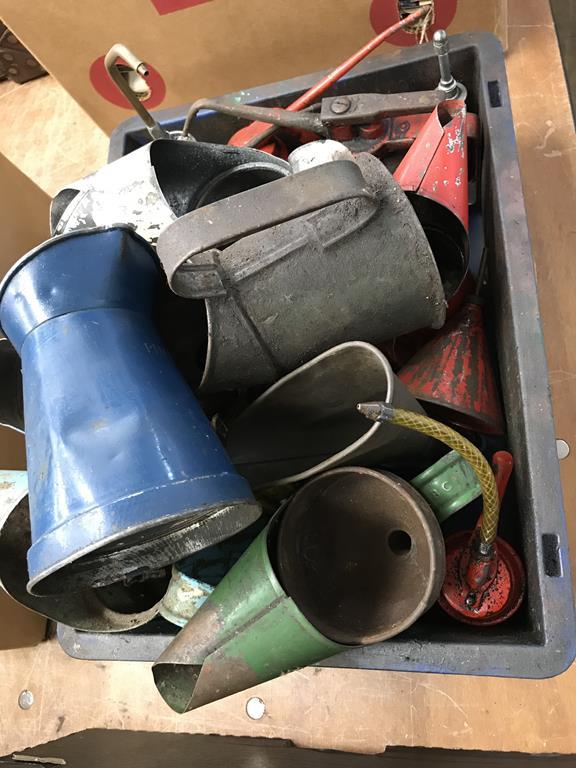 Various vintage oil cans