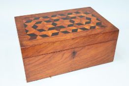 A walnut parquetry work box, a carved wood box and two others