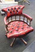 A Chesterfield style revolving office chair