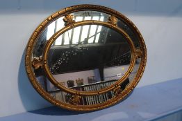 A gilt framed mirror