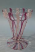 A decorative glass vase, with white and pink swirls and lines, 20cm height