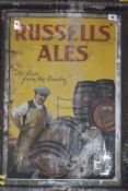 A large tinplate advertising sign, 'Russell's Ales'
