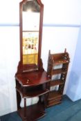 A reproduction hall stand and an open bookcase