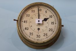 A large brass ships clock