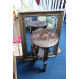 A carved occasional table and a gilt mirror