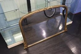 A gilt framed over mantle mirror, 108cm wide, 78cm long