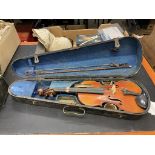 Two violins and cases