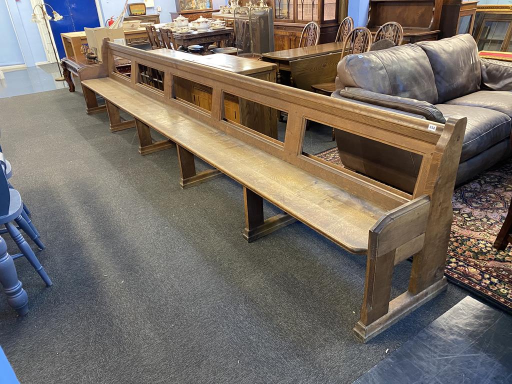 A long oak Church pew, 461cm (15 foot)