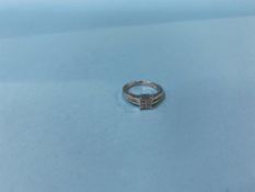 An '18k' white gold and diamond ring, 3.7g