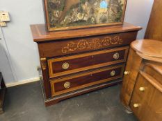 A Continental chest of three drawers