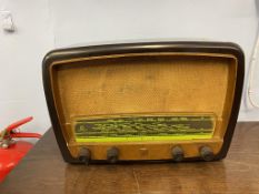 A brown Bakelite radio