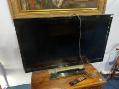An LG Television, with remote
