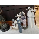Four various Lladro figures