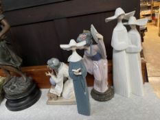 Four various Lladro figures