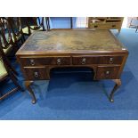 A walnut ladies writing desk, with inset leather top, 105cm wide