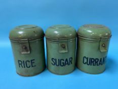 Three green tin storage jars