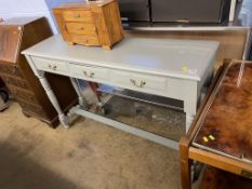 A grey three drawer hall table, 132cm long