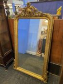 A gilt overmantle mirror, 153cm x 83cm