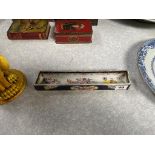 A Continental porcelain rectangular dish decorated with flowers and gilt decoration, on a blue