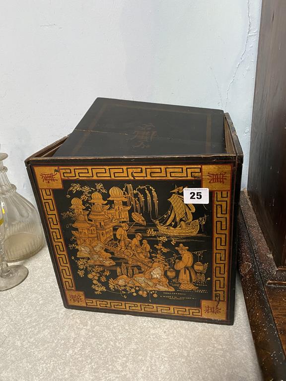 A Chinese lacquered box, 28cm wide