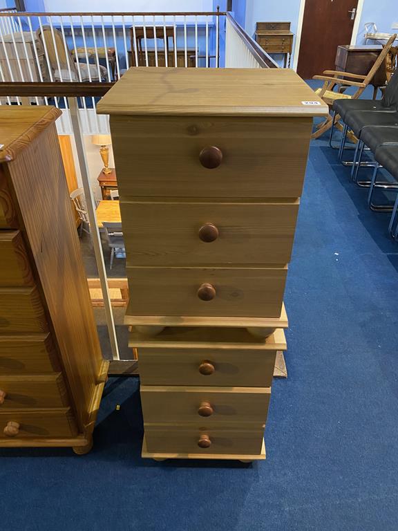 A pair of bedside chests