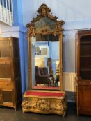 A large gilt Hall mirror and stand, 270cm high, 106cm wide