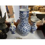 A Chinese blue and white baluster shaped vase, decorated with flowers and leaves, and an applied