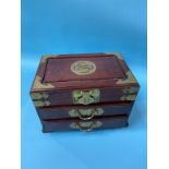 An Oriental hardwood jewellery box and a quantity of jewellery