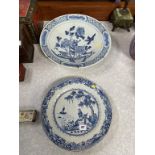 A 19th century blue and white plate, 31cm diameter and a large Japanese Imari dish, 41cm diameter